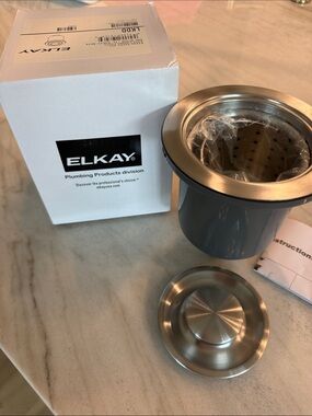 NWT Elkay 3 1/2 inch basket strainer and stopper drain.